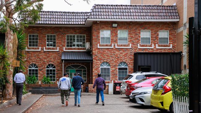 People arrive at Bankstown’s Al Madina Dawah Centre. Picture: Justin Lloyd