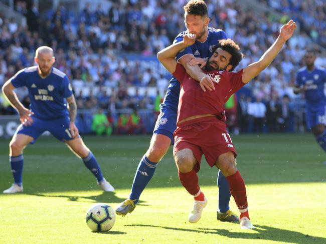 CARDIFF, WALES - APRIL 21:  Mohamed Salah of Liverpool is fouled by Sean Morrison of Cardiff City for a penalty during the Premier League match between Cardiff City and Liverpool FC at Cardiff City Stadium on April 21, 2019 in Cardiff, United Kingdom. (Photo by Mike Hewitt/Getty Images)