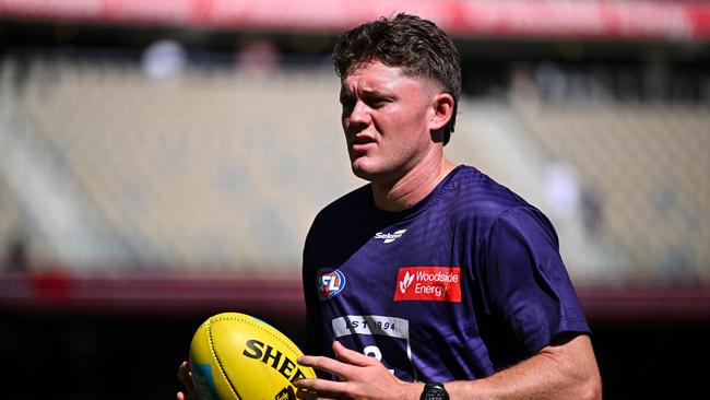 PERTH, AUSTRALIA - MARCH 23: Nathan O'Driscoll of the Dockers warms up during the 2025 AFL Round 02 match between the Fremantle Dockers and the Sydney Swans at Optus Stadium on March 23, 2025 in Perth, Australia. (Photo by Daniel Carson/AFL Photos via Getty Images)