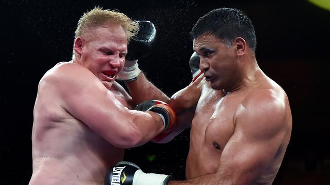 Ben Hannant was brave in defeat against Justin Hodges. Picture: Albert Perez/Getty Images