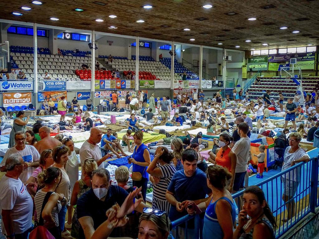 As many as 40,000 tourists have been evacuated or displaced due to historic fires on the Greek island of Rhodes. Picture: AFP