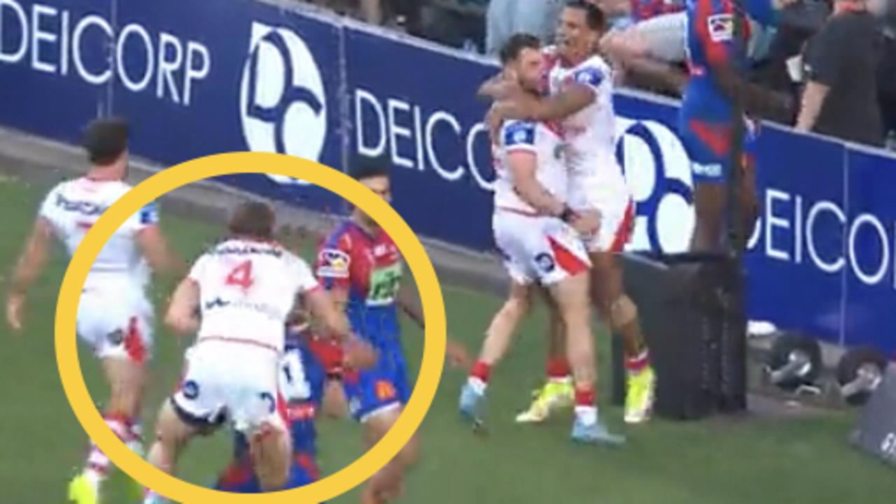 Zac Lomax on Tyson Frizell's back as the Dragons celebrate a try. Picture: Fox League