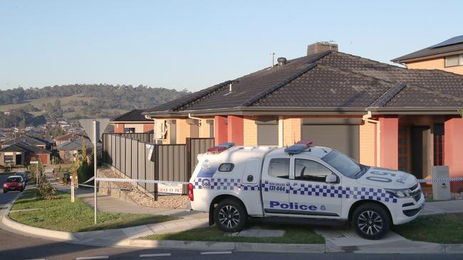 Police at on scene at the house in Mernda on Saturday where the infant was found dead. Picture: David Crosling