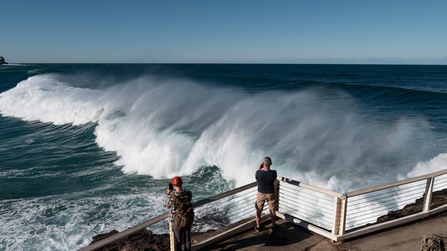 Sydneysiders risked a splash to watch huge waves off the coastline roll in. Picture: NCA NewsWire / Flavio Brancaleone