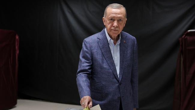 Turkish President Recep Tayyip Erdogan casts his ballot at a polling station to vote in the presidential and parliamentary elections Turkey, on May 14. Picture: Umit Bektas/Pool/AFP