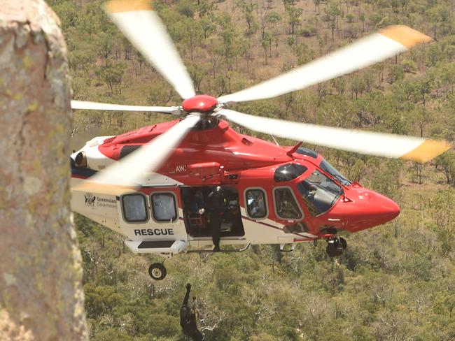 rock climber winched to safety by rescue helicopter off Mt Stuart. Picture: Evan Morgan