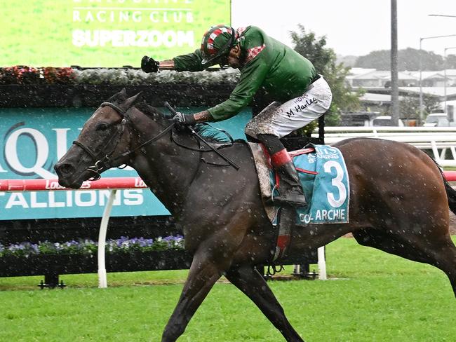 Cool Archie and Irish jockey Martin Harley cross the finishing post to secure victory in the Group 2 BRC Sires' Produce (1400m) for trainers Chris and Corey Munce on a wet day at Eagle Farm on Saturday, May 31, 2025. Picture: Grant Peters, Trackside Photography