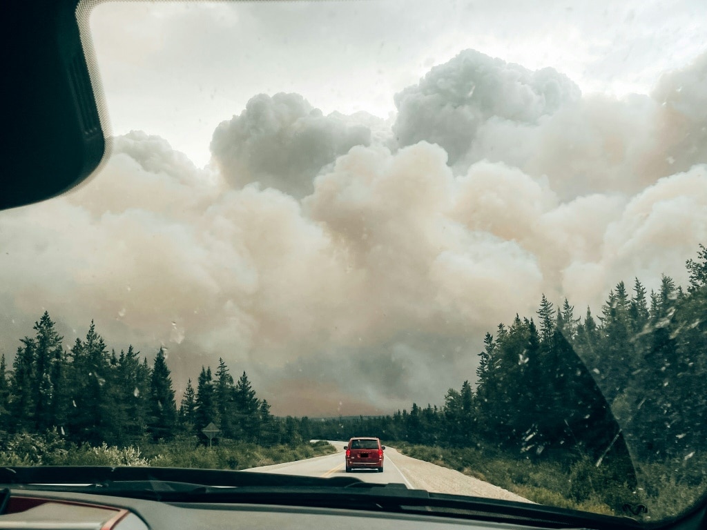 Wildfire smoke engulfing a forest in the northern zone of Canada's Quebec Province in mid July