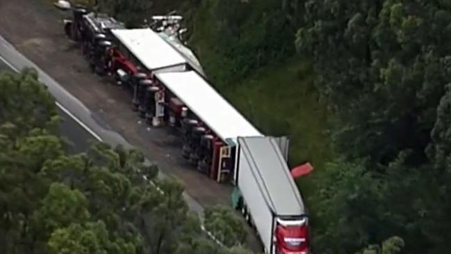 The aftermath of the B-double truck rollover at Gaven on the Gold Coast. Picture: 9 News Gold Coast