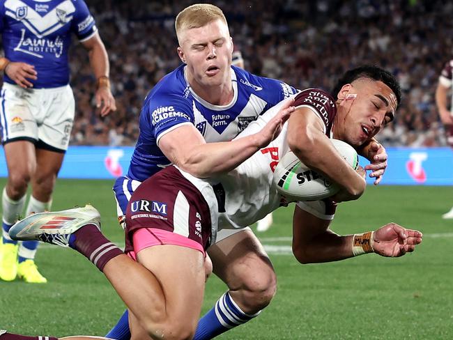 SYDNEY, AUSTRALIA - AUGUST 30:  Lehi Hopoate of the Sea Eagles scores a try during the round 26 NRL match between Canterbury Bulldogs and Manly Sea Eagles at Accor Stadium on August 30, 2024, in Sydney, Australia. (Photo by Cameron Spencer/Getty Images)