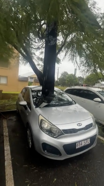 Ex-Cyclone Alfred sends gutter flying, impales car