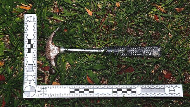 Police photos from the Cobby crime scene, including the hammer Andrew Cobby used to attack Kym Cobby.