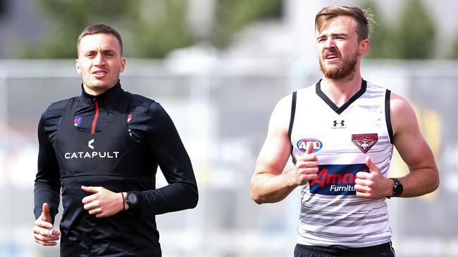 Orazio Fantasia (left) runs laps with Martin Gleeson.