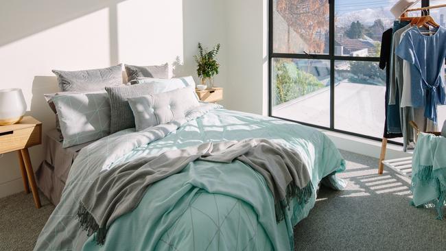 A makeover doesn’t have to be expensive and can be as simple as updating your bed linen. This room is styled with Kmart homewares. Picture: Kmart