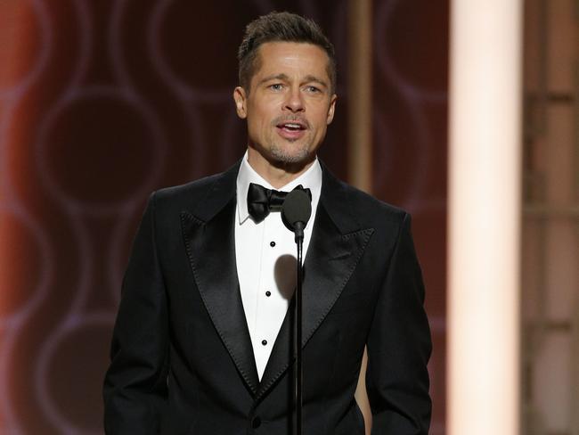 Brad Pitt just being handsome and stuff at the 74th Golden Globe Awards at The Beverly Hilton Hotel.
