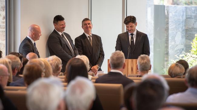 Dick Lang’s sons Derek, Justin and Lachlan give the eulogy to their father and brother. Picture: Brad Fleet