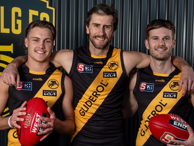 21.09.23 - SANFL finals: Glenelg's Archie Lovelock, Max Proud, and Jonty Scharenberg at Glenelg Oval. They have a special family connection. Picture: Naomi Jellicoe