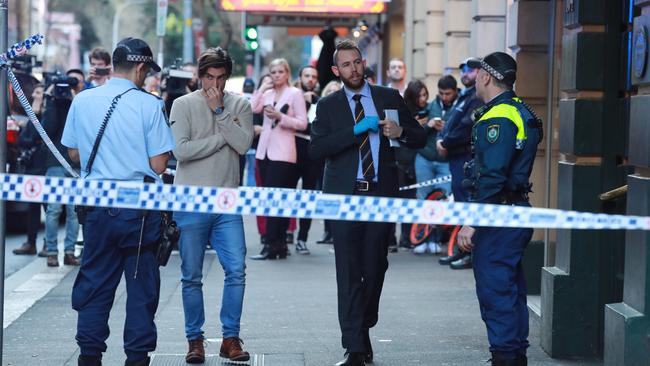 Police tape off 104 Clarence Street where a woman’s body was found following the alleged attack. Picture: Justin Lloyd.