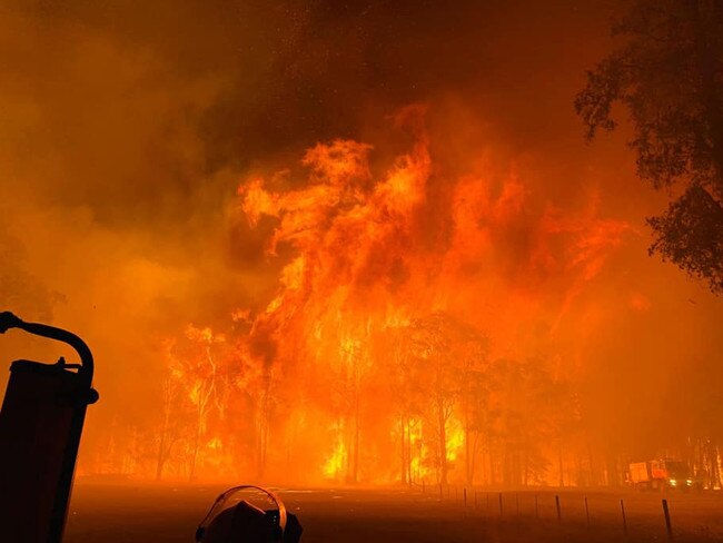 The out-of-control Green Wattle Creek bushfire burning near Braddocks Rd, Werombi, on December 5. Picture: Picton Fire and Rescue