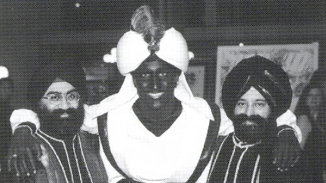 This April 2001 photo, which appeared in a newsletter from the West Point Grey Academy, shows a costumed Justin Trudeau, his face and hands darkened by makeup.