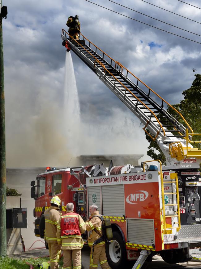 Emergency services attack the fire at Hawthorn East. Picture: Tony Gough