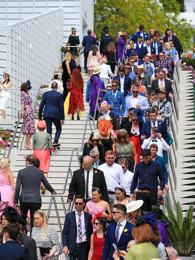 2019 Melbourne Cup Day at Flemington Racecourse, Melbourne, Victoria. Punters use the new stairs. Picture: Mark Stewart