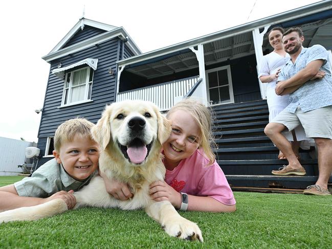 14/12/2024: Steven and Brittany Keim and their kids Charleigh 9 and Lachlan 5 (with puppy Lenny ), at their home in Wellington Point. They have listed their home for sale their home in one of the nation's fastest selling regions, Capalaba, in outer eastern Brisbane.  pic: Lyndon Mechielsen/The Australian