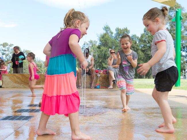 Children cool off at the Werrington Lakes Reserve splash pad.