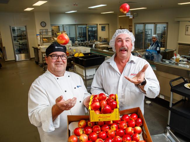 24/1/2020 RAH Executive Chef Stuart Mc Pherson with Apple producer Robert Green. Robert had a significant part of his orchard damaged from the recent Adelaide Hills fires, but he is supporting Lenswood Apple's new venture in supplying the Royal Adelaide Hospital, through produce he had in cold storage.