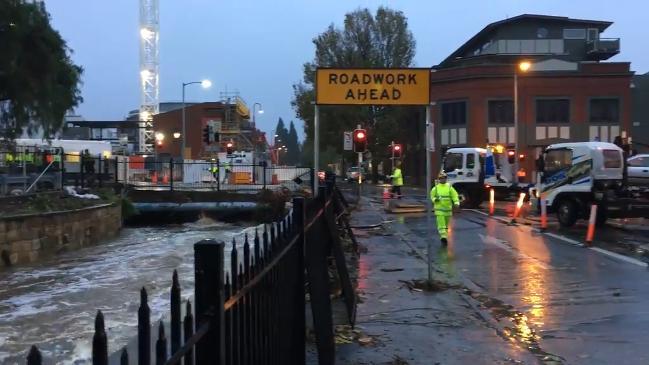 Flood clean up in Market Place and Collins st, Hobart