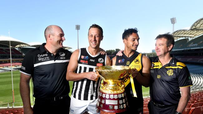 Port Adelaide coach Matt Lokan with captain Cam Sutcliffe and Glenelg vice-captain Marlon Motlop with coach Mark Stone at Tuesday’s SANFL grand final press conference at Adelaide Oval. Picture: Tricia Watkinson