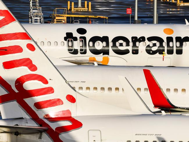 Planes from Tigerair and Virgin sit idle at Melbourne's Tullamarine Airport. Picture: AFP