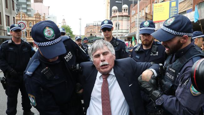 Western Sydney lecturer Martin Wolterding being arrested this week. Picture: Richard Dobson