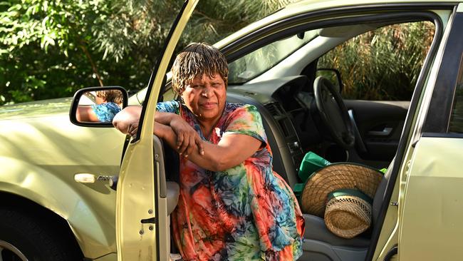 Betty Zimike with her car where she would sleep while she was homeless for eight weeks. Picture: Lyndon Mechielsen/Courier Mail