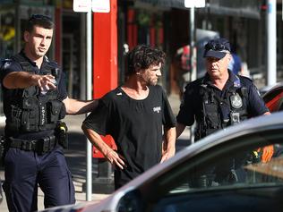CBD arrest: Cops nab armed man accused of 'punching on'