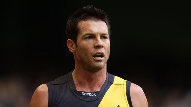 MELBOURNE, AUSTRALIA - AUGUST 29:  Ben Cousins of the Tigers walks the sideline after being substituted during the round 22 AFL match between the Richmond Tigers and the Port Power at Etihad Stadium on August 29, 2010 in Melbourne, Australia.  (Photo by Scott Barbour/Getty Images)