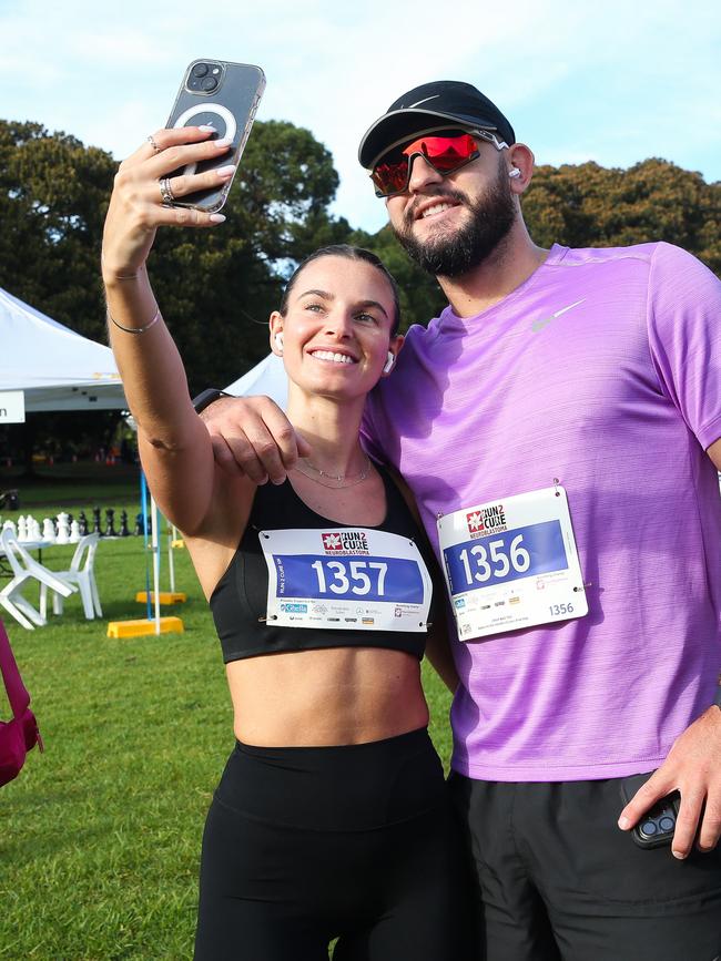 Runners taking a selfie to remember the event. Picture: Gaye Gerard