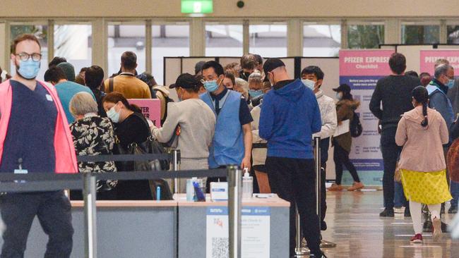 People entering the Wayville COVID-19 vaccination hub in Adelaide. Picture: NCA NewsWire /Brenton Edwards