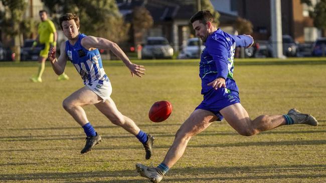 Josh Mackenzie boots Berwick Springs forward. Picture Valeriu Campan