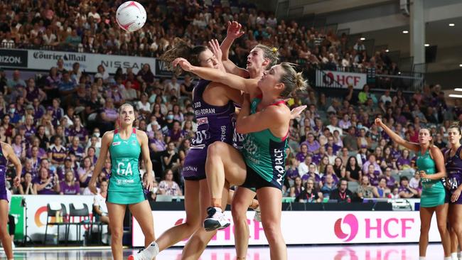 Ruby Bakewell-Doran of the Firebirds clashes with the Vixens’ Liz Watson. Picture: AAP