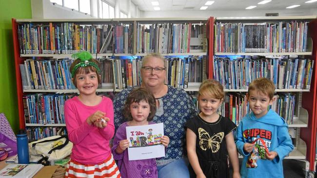 Author Deb Stevens with Jessica and Eloise Mungall, Elizabeth Healey and Bailey Small. Picture: Madeline Grace