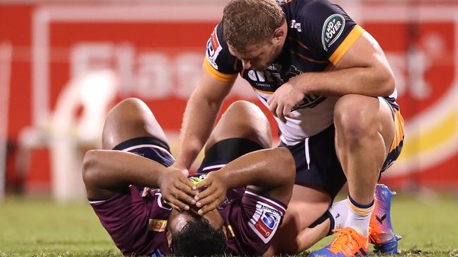 Taniela Tupou of the Reds and James Slipper of the Brumbies embrace following the Super Rugby AU Grand Final. Picture: Getty Images