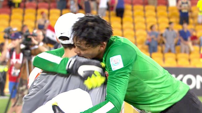 Stephen White, 12, is thank by China goalkeeper Wang Dalei.