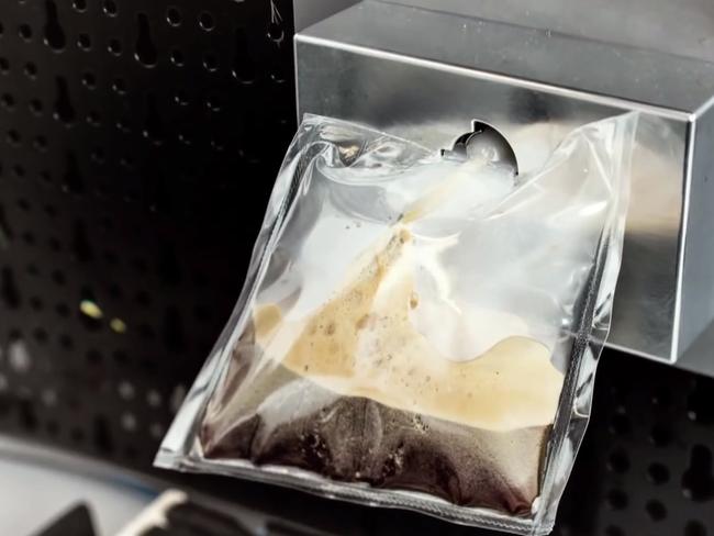 Cosmic brew ... Fresh coffee is delivered into a zero-gravity drinking pouch. The espresso machine is due to be delivered to the International Space Station early next year.