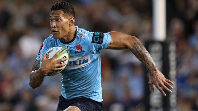 Israel Folau of the Waratahs runs the ball during the Round 7 Super Rugby match between the New South Wales Waratahs and the Sunwolves at McDonald Jones Stadium in Newcastle, Friday, March 29, 2019. (AAP Image/Paul Barkley) NO ARCHIVING, EDITORIAL USE ONLY