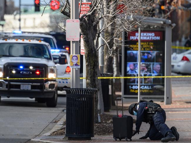 A member of the DC Bomb squad checks a suspicious bag in Washington, DC. Picture: AFP