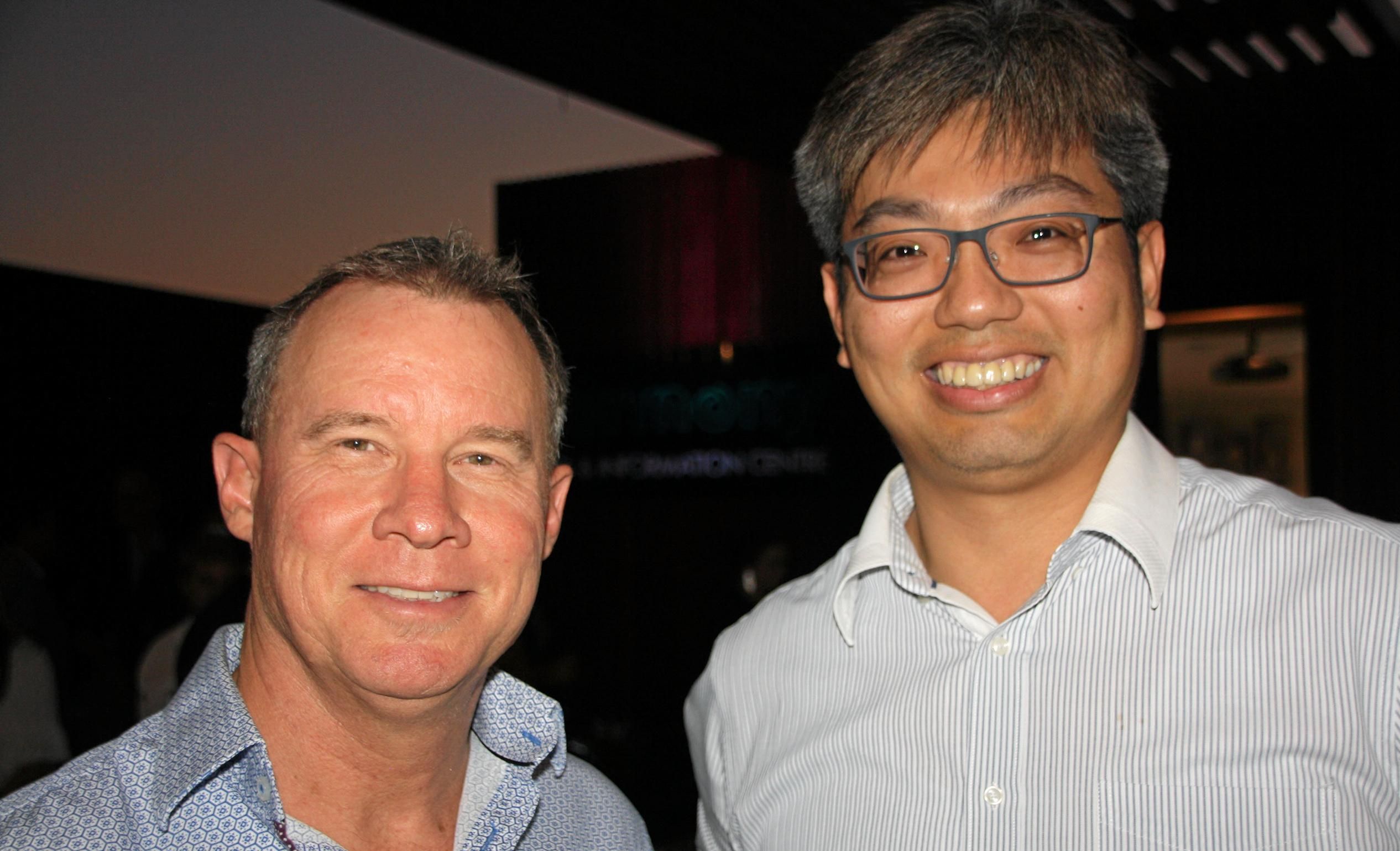 Peter Folker of Project Urban and Felix Kuo of RPS at AVID Property Group's launch of its new sales and information centre in Palmview's master-planned community of Harmony. Picture: Erle Levey