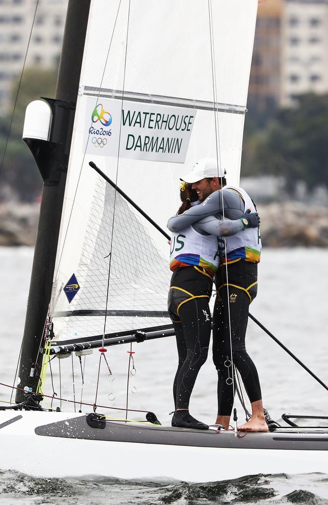 Jason Waterhouse and Lisa Darmanin of Australia celebrate winning.