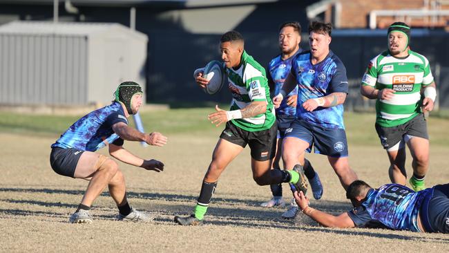 Gold Coast District Rugby Union (GCDRU) first grade clash between Helensvale Hogs (Blue) and Palm Beach Currumbin Alleygators (Green). Match Played at Helensvale. Pic Mike Batterham