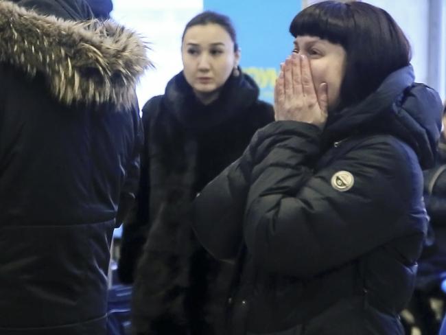 Family and friends devastated after a Russian passenger plane carrying 71 people crashed, killing everyone on board. Picture: Orsk.ru/AP